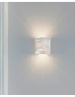 Aplique de pared Kala - a-emotional light - Diseño elegante de malla de acero inoxidable