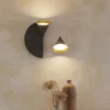 Aplique de pared Rubi – Robin – Lámpara moderna en negro y dorado