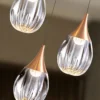 Lámpara colgante Corina - Schuller - 3 luces de acrílico, acabado dorado